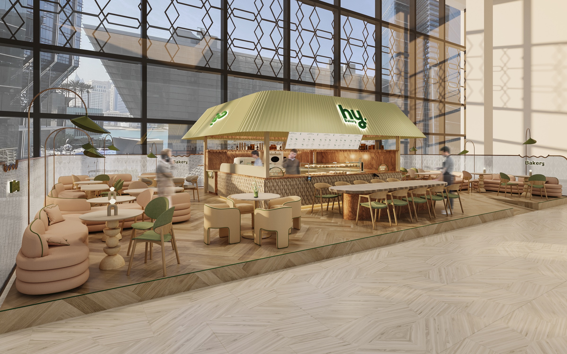 The green bakery counter and seating inside hy Bakery