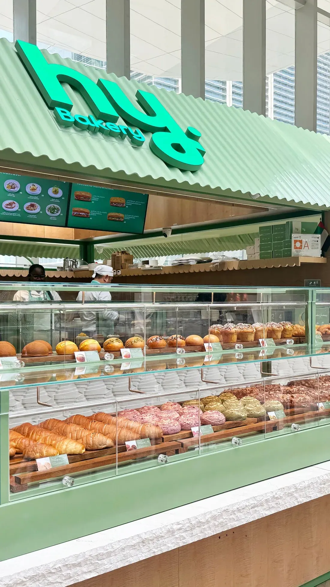hy Bakery counter with croissants, buns and breads on display
